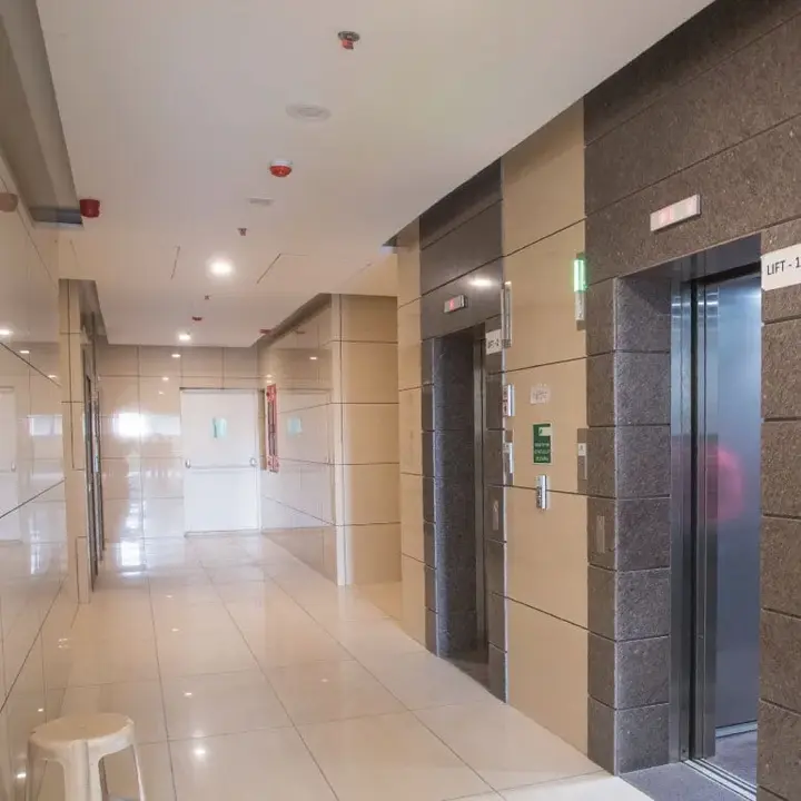 Elegant living room with blue ottoman